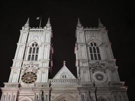 Westminster Abbey church at night in London photo