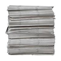 pile of newspapers isolated over white photo