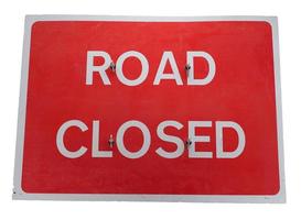 road closed sign isolated over white photo