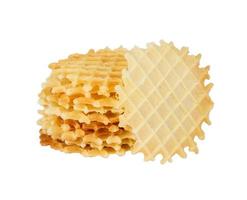 A stack of golden round waffles isolated. photo