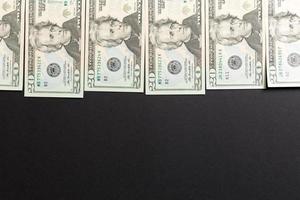 one hundred dollar bills Top view of business concept on background with copy space photo