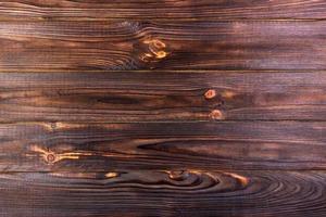 la textura de madera vieja marrón con nudo foto