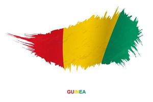 bandera de guinea en estilo grunge con efecto ondulante. vector