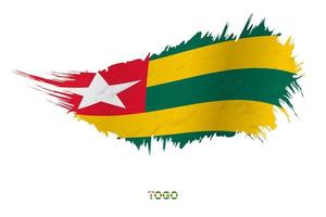 Flag of Togo in grunge style with waving effect. vector