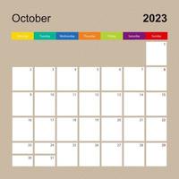 página de calendario para octubre de 2023, planificador de paredes con diseño colorido. la semana comienza el lunes. vector