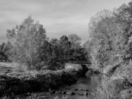 autumn time at a river in germany photo