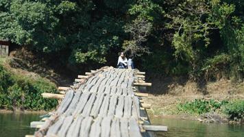 The classical wooden bridge view located in the countryside of the China photo