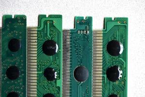 Old electronic boards for retro games. Cartridges for retro game consoles. photo