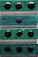 Old electronic boards for retro games. Cartridges for retro game consoles. photo