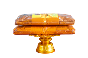 set of monk's robes placed on a pedestal Isolate on transparent background PNG file