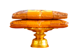 set of monk's robes placed on a pedestal Isolate on transparent background PNG file