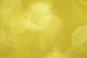 Abstract yellow background. Defocus light with bokeh. Spring, Summer, Christmas, New Year. Copy space photo