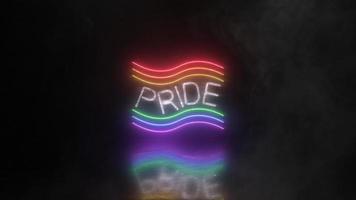 Pride neon rainbow text with smoke or fog effect. Pride neon sign with light reflection on the floor on black background.Pride day, love,tolerance, freedom and lgtb community concept.Animation 4k