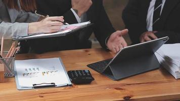 Businessman working with smart phone and laptop and digital tablet computer in office with digital marketing media in virtual icon video