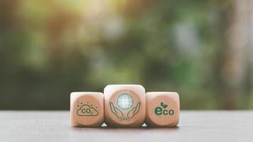 wooden blocks on table natural background,concept protecting environment alternative energy Sustainable renewable energy sources Green energy innovation and environmentally friendly energy technology photo