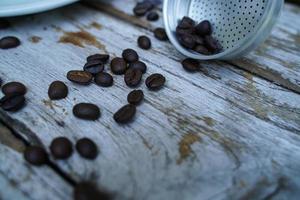 Roasted coffee beans, coffee is a popular beverage all over the world. photo