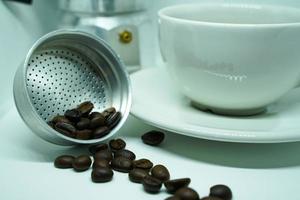 Roasted coffee beans, coffee is a popular beverage all over the world. photo