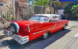 Playa del Carmen Quintana Roo Mexico 2022 Various colorful tuned cars and classic vintage cars  Mexico. photo