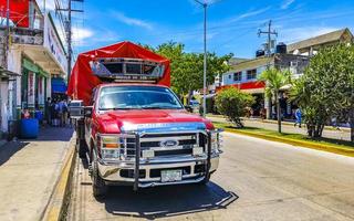 Playa del Carmen Quintana Roo Mexico 2022 Various Mexican trucks transporters vans delivery cars in Mexico. photo