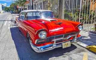 Playa del Carmen Quintana Roo Mexico 2022 Various colorful tuned cars and classic vintage cars  Mexico. photo