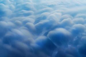 Blue Cumulus clouds, a rare atmospheric phenomenon. photo