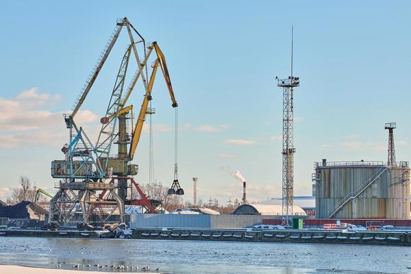 Harbor cranes, container ship terminal, cargo container yard