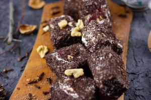 Winter chocolate sweets. Pieces of chocolate pastries. photo