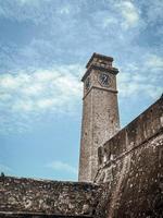 Clocktower in a city. photo