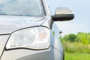 A car parked on the green grass photo