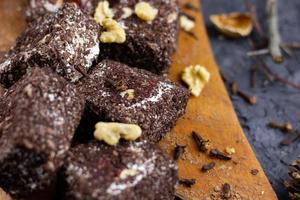 Winter chocolate sweets. Pieces of chocolate pastries. photo