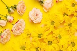 yellow flowers and white-pink roses photo