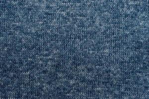 Blue soft knit fabric pattern close up as background photo