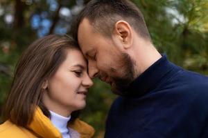 close-up portrait of middle-aged man and woman in love photo