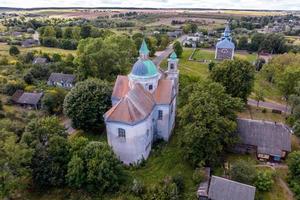 aerial view on baroque temple or catholic church in countryside photo