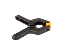 Universal plastic black-orange clamp isolated photo