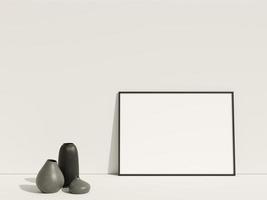 Clean and minimalist front view horizontal black photo or poster frame mockup leaning against the wall with vase. 3d rendering.