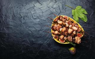 Yummy BBQ with chicken and figs photo
