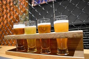 Tasting of four types of craft beer photo