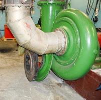 Repair of industrial compressor. Green compressor impeller. Repair of equipment. photo