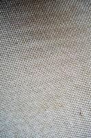 Texture of beige natural fabric, background photo