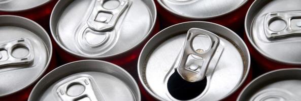 Many aluminium soda drink cans. Advertising for Soda drinks or tin cans mass manufacturing photo