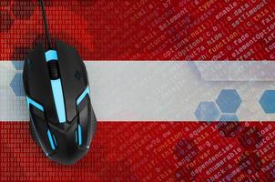 Austria flag  and computer mouse. Digital threat, illegal actions on the Internet photo