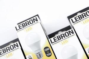 KHARKOV, UKRAINE - MARCH 30, 2021 Many Lebron LED light bulbs. Lebron is chinese light equipment manufacturer photo