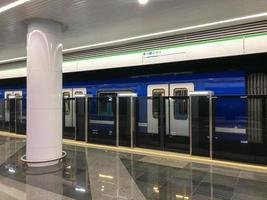 subway with increased security. new metro stations. double security, automatic doors before entering the train. inside the cars there are comfortable seats and handrails photo