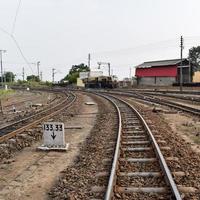 View of Toy train Railway Tracks from the middle during daytime near Kalka railway station in India, Toy train track view, Indian Railway junction, Heavy industry photo