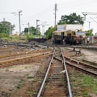 View of Toy train Railway Tracks from the middle during daytime near Kalka railway station in India, Toy train track view, Indian Railway junction, Heavy industry photo