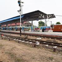 View of Toy train Railway Tracks from the middle during daytime near Kalka railway station in India, Toy train track view, Indian Railway junction, Heavy industry photo