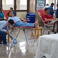 Delhi, India, June 19 2022 - Blood donor at Blood donation camp held at Balaji Temple, Vivek Vihar, Delhi, India, Image for World blood donor day on June 14 every year, Blood Donation Camp at Temple photo