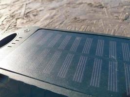 Travel power bank on a solar battery photo