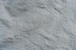 Background and textured surface of canvas gray color. photo